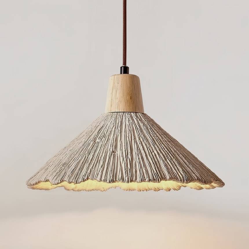 Suzu pendant light, a textured concrete shade beneath a pale timber cap