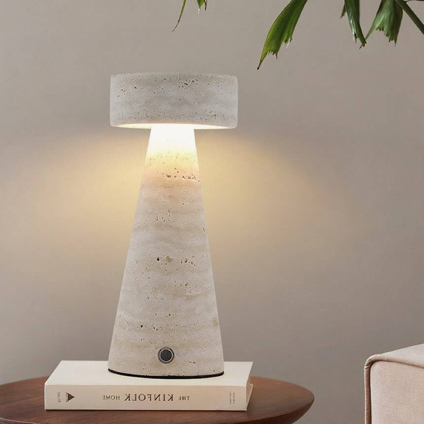 Todai cordless lamp, a tapered natural travertine table lamp
